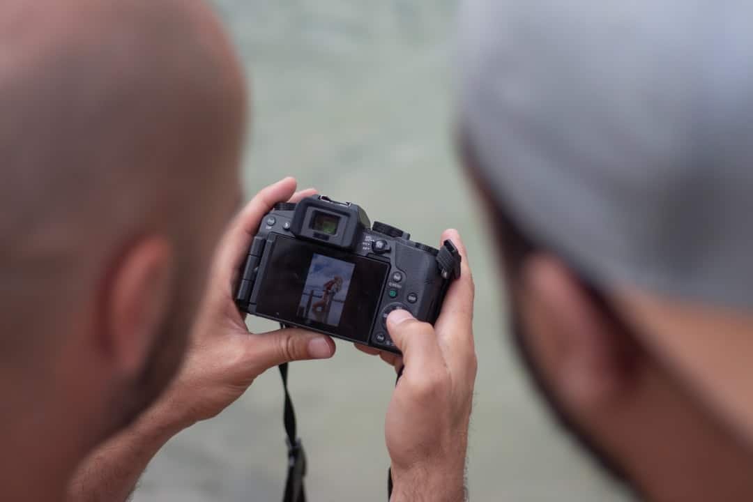 A close up of a person holding a cell phone