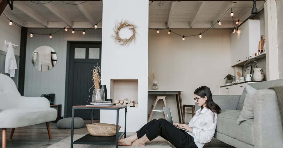 A person sitting on a chair in a room