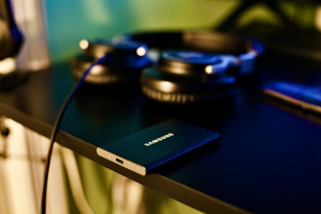 A close up of a laptop computer sitting on top of a table