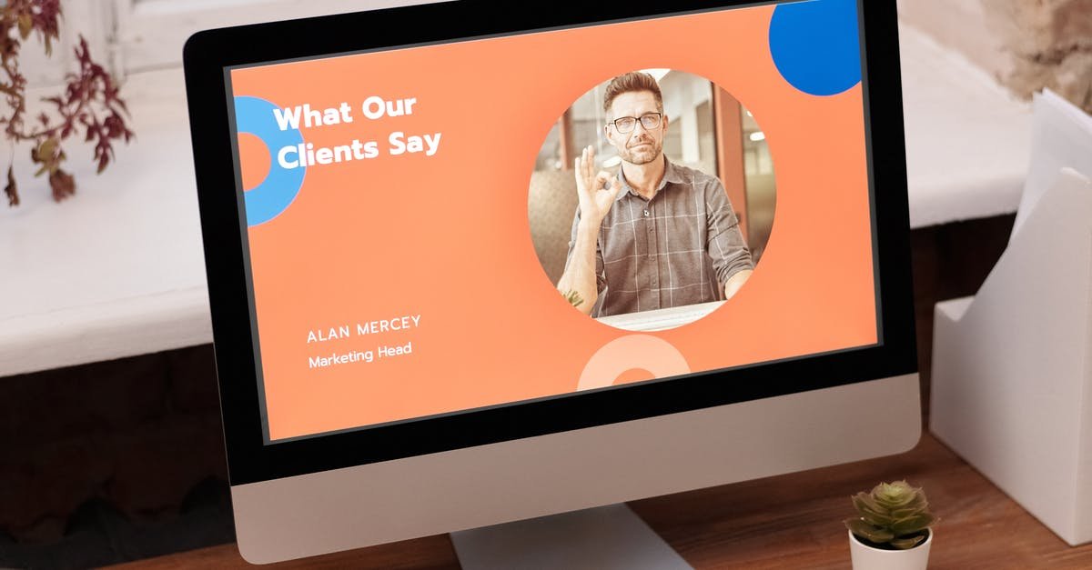 A flat screen tv sitting on top of a table