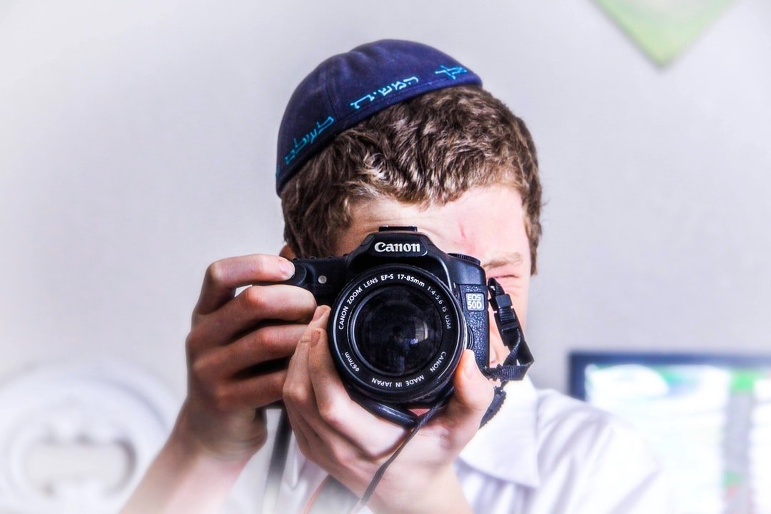 A man holding a camera
