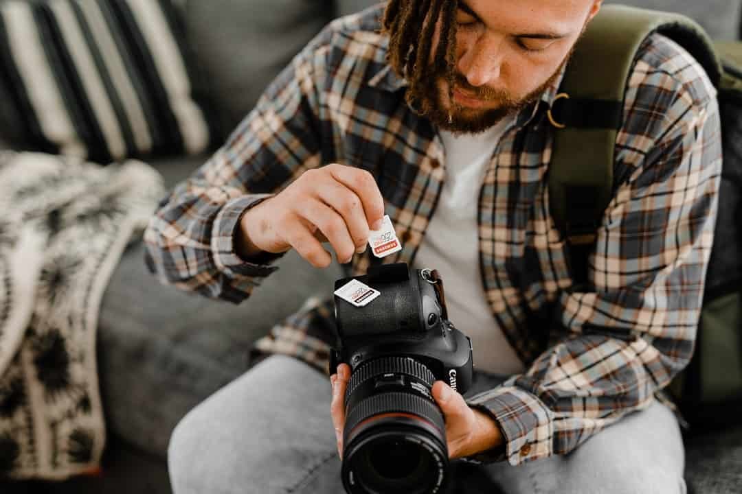 A man holding a camera