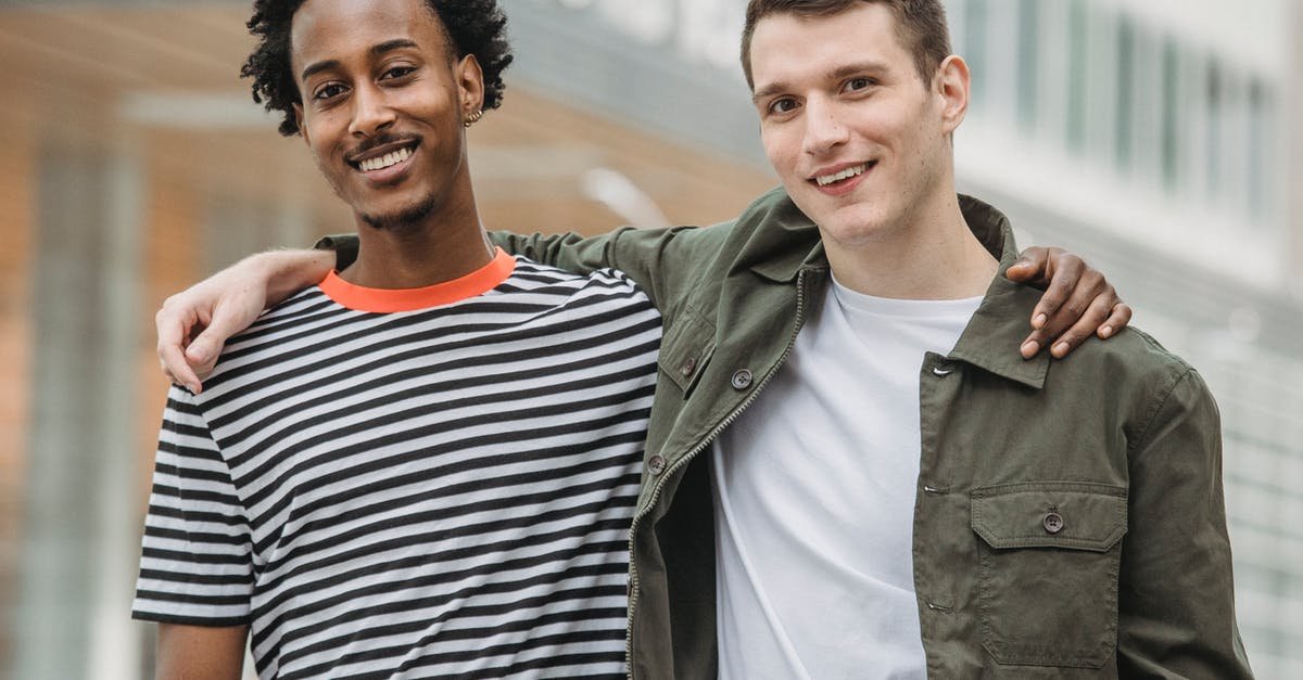 A man and a woman smiling for the camera