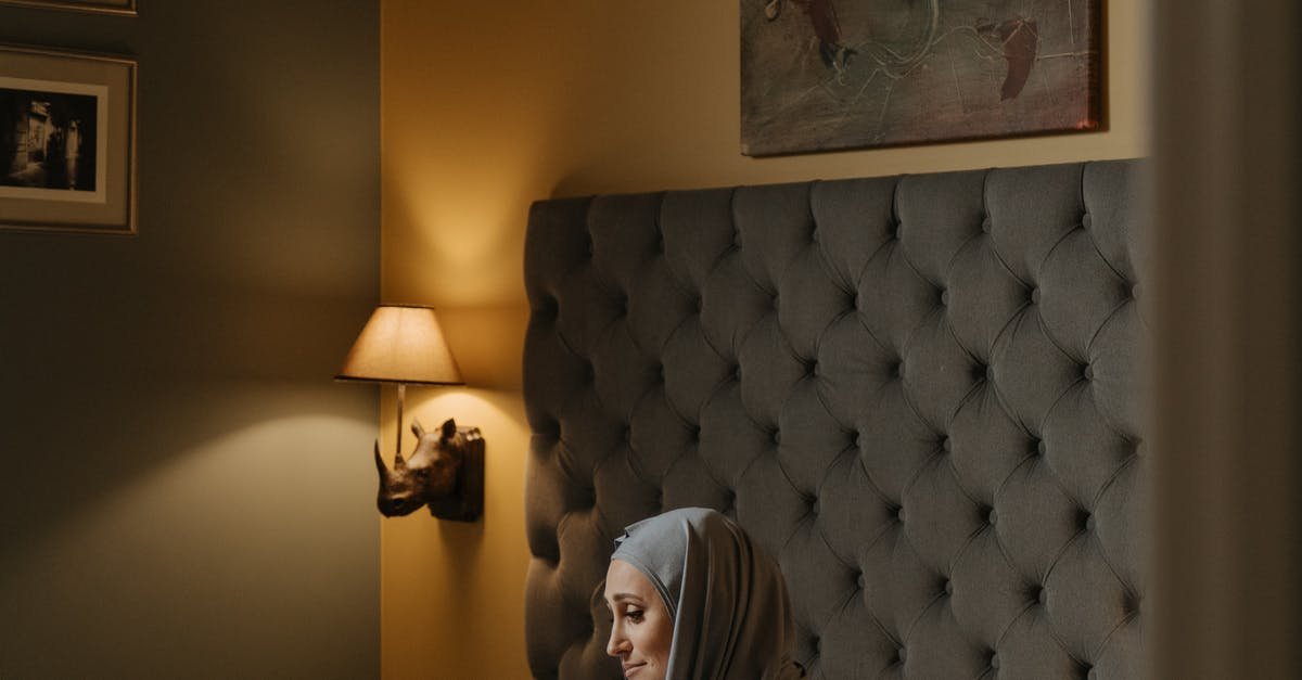 A person standing in front of a mirror posing for the camera