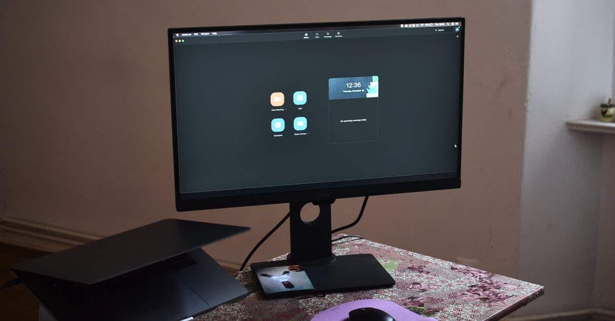 A desktop computer monitor sitting on top of a table